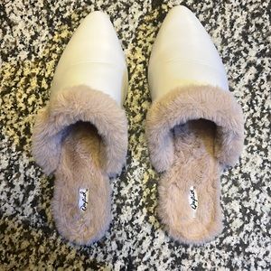 Pointe toe slide on shoes with a Fur.